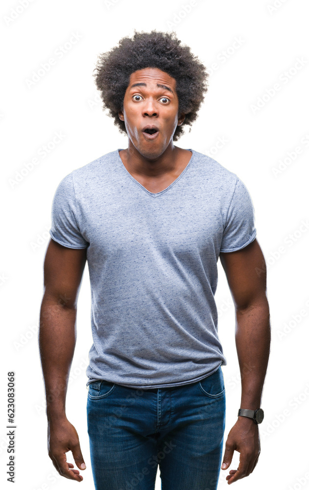 Afro american man over isolated background afraid and shocked with surprise expression, fear and excited face. Afro american man over isolated background afraid and shocked with surprise expression, fear and excited face.