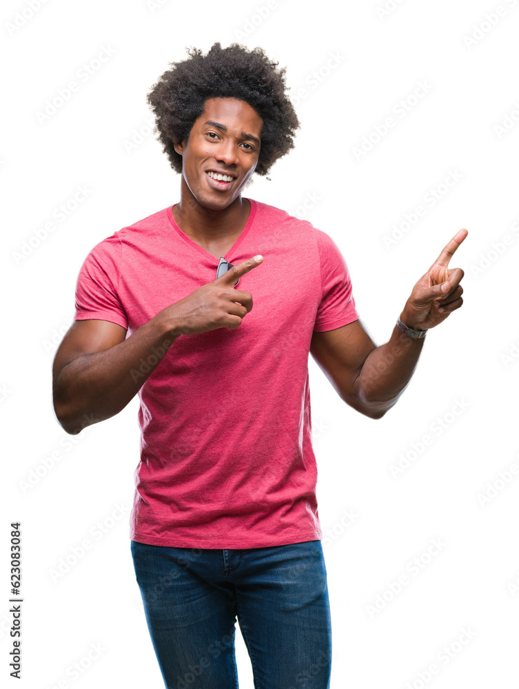 Afro american man over isolated background smiling and looking at the camera pointing with two hands and fingers to the side. Afro american man over isolated background smiling and looking at the camera pointing with two hands and fingers to the side.
