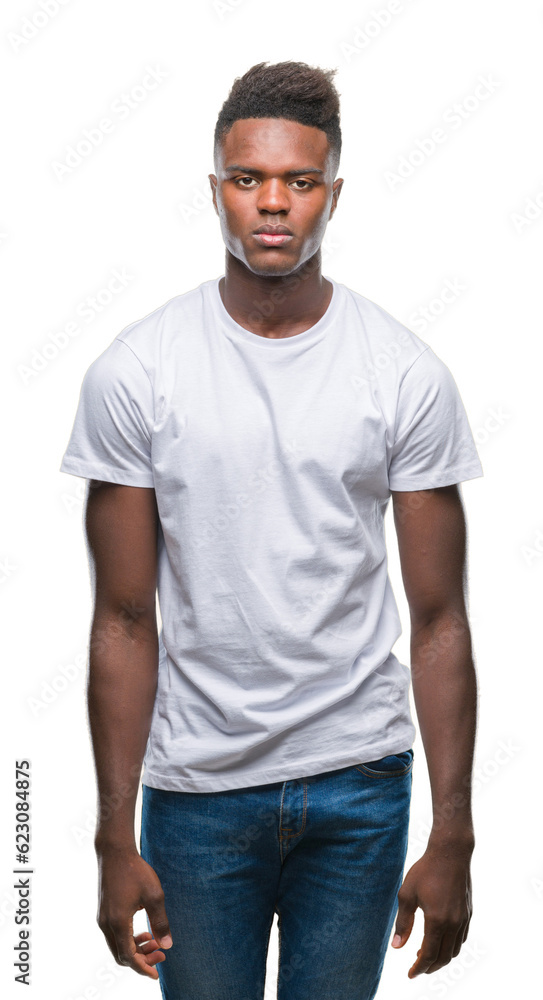Young african american man over isolated background with serious expression on face. Simple and natural looking at the camera. Young african american man over isolated background with serious expression on face. Simple and natural looking at the camera.