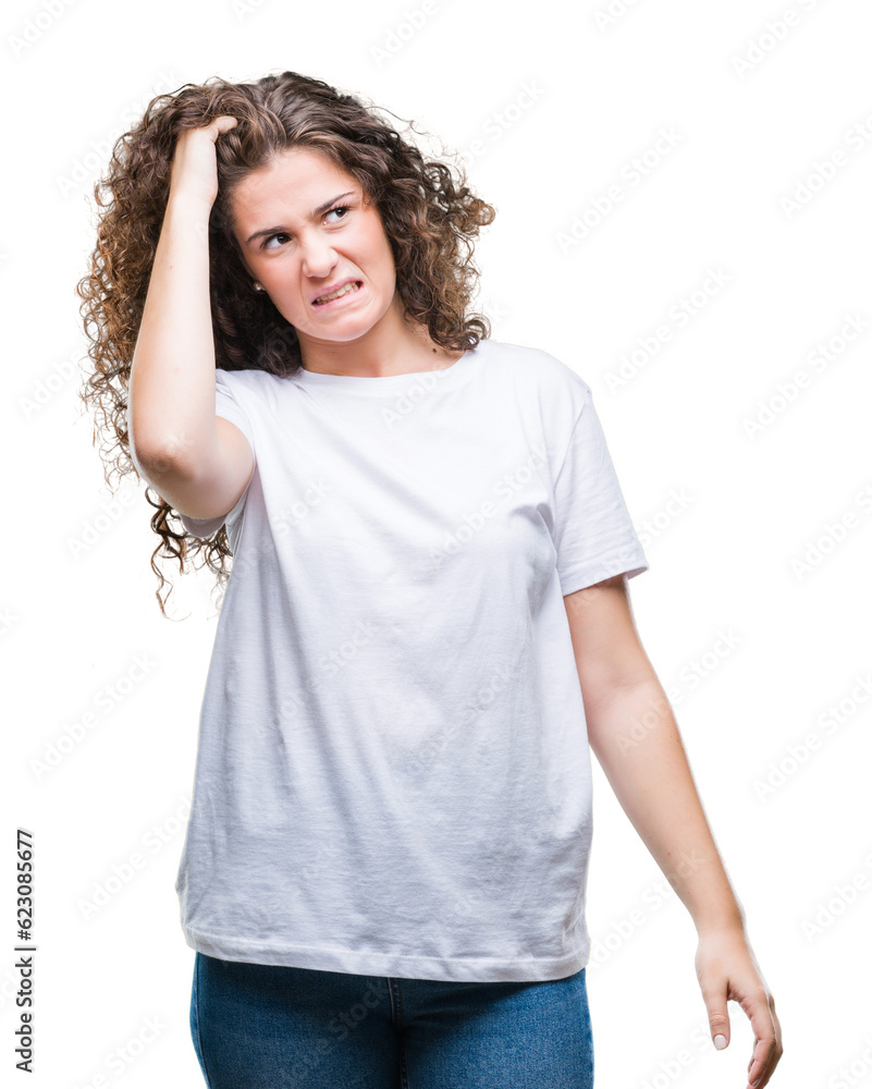 Beautiful brunette curly hair young girl wearing casual t-shirt over isolated background confuse and wonder about question. Uncertain with doubt, thinking with hand on head. Pensive concept. Beautiful brunette curly hair young girl wearing casual t-shirt over isolated background confuse and wonder about question. Uncertain with doubt, thinking with hand on head. Pensive concept.