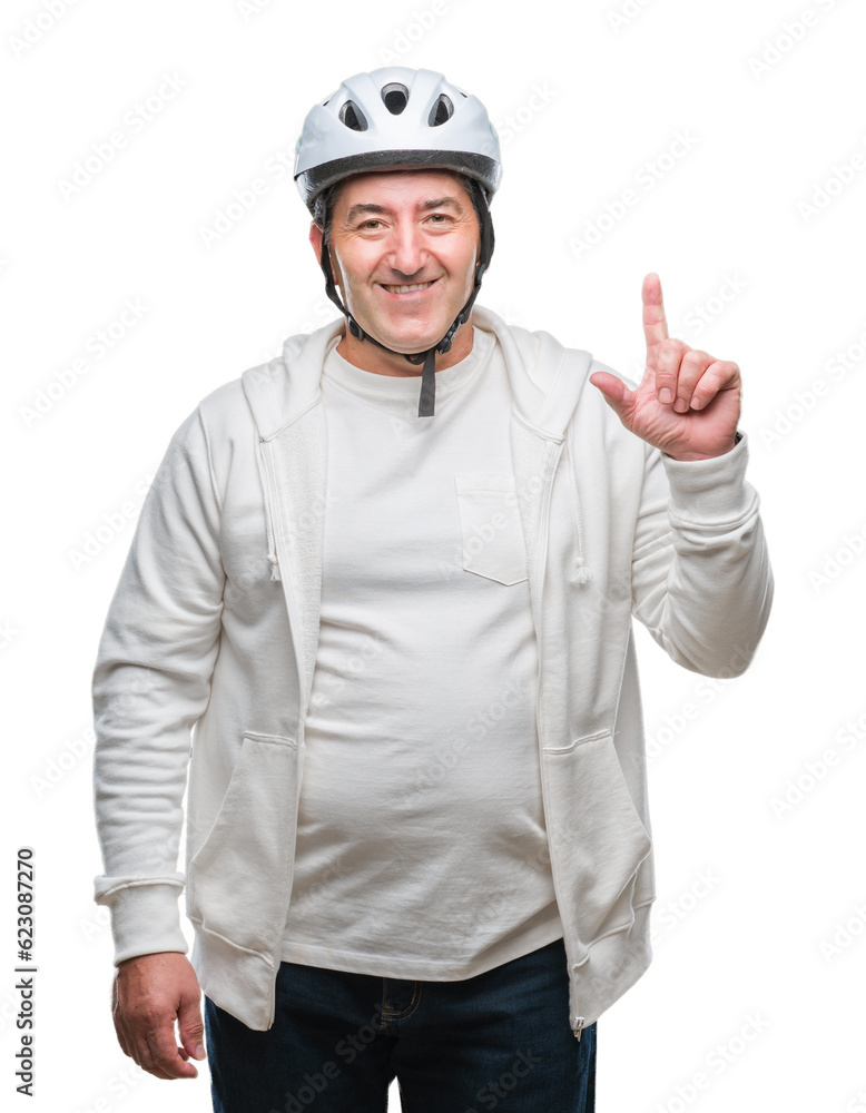 Handsome senior cyclist man wearing bike helmet over isolated background surprised with an idea or question pointing finger with happy face, number one Handsome senior cyclist man wearing bike helmet over isolated background surprised with an idea or question pointing finger with happy face, number one