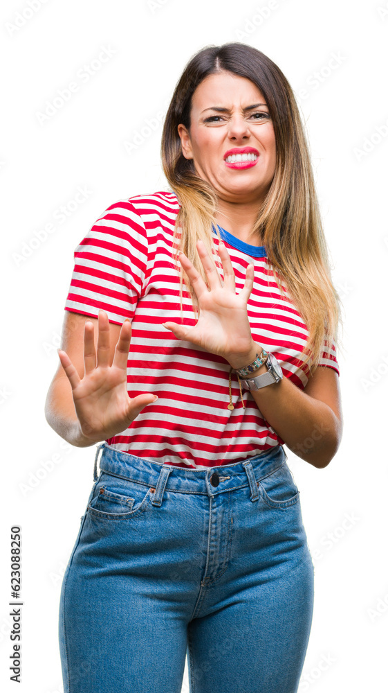 Young beautiful woman casual look over isolated background disgusted expression, displeased and fearful doing disgust face because aversion reaction. With hands raised. Annoying concept. Young beautiful woman casual look over isolated background disgusted expression, displeased and fearful doing disgust face because aversion reaction. With hands raised. Annoying concept.