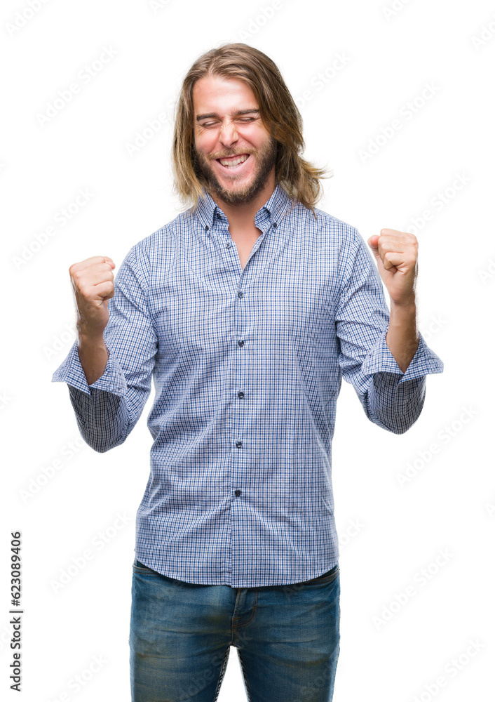 Young handsome man with long hair over isolated background very happy and excited doing winner gesture with arms raised, smiling and screaming for success. Celebration concept. Young handsome man with long hair over isolated background very happy and excited doing winner gesture with arms raised, smiling and screaming for success. Celebration concept.