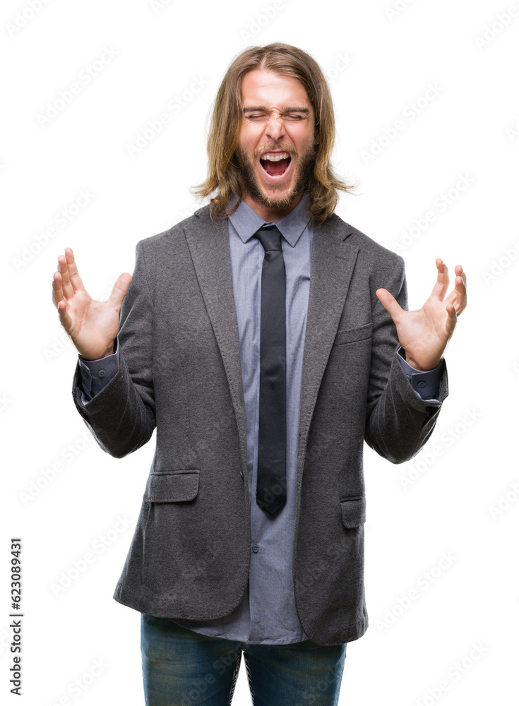 Young handsome business man with long hair over isolated background celebrating mad and crazy for success with arms raised and closed eyes screaming excited. Winner concept Young handsome business man with long hair over isolated background celebrating mad and crazy for success with arms raised and closed eyes screaming excited. Winner concept