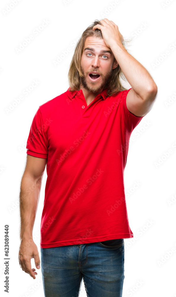 Young handsome man with long hair over isolated background surprised with hand on head for mistake, remember error. Forgot, bad memory concept. Young handsome man with long hair over isolated background surprised with hand on head for mistake, remember error. Forgot, bad memory concept.