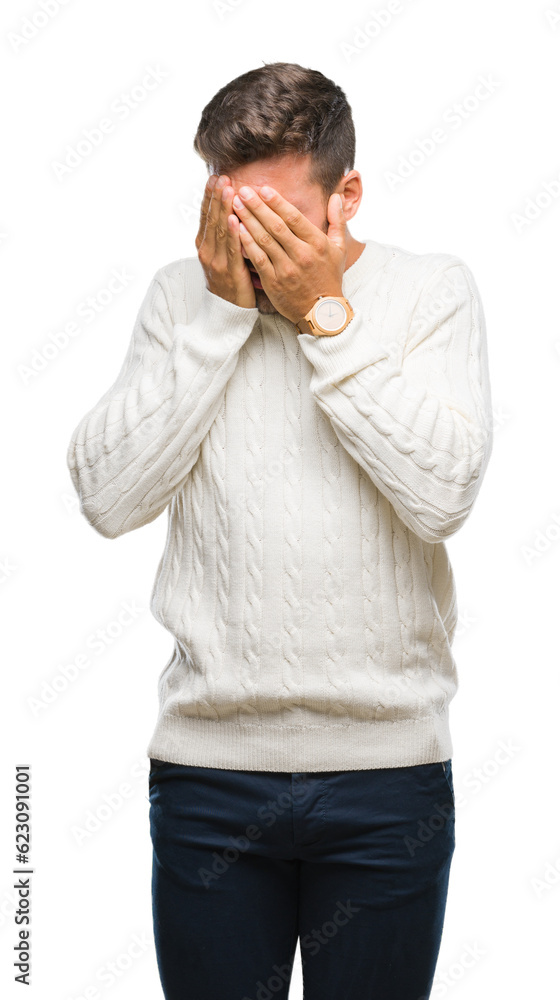 Young handsome man wearing winter sweater over isolated background with sad expression covering face with hands while crying. Depression concept. Young handsome man wearing winter sweater over isolated background with sad expression covering face with hands while crying. Depression concept.
