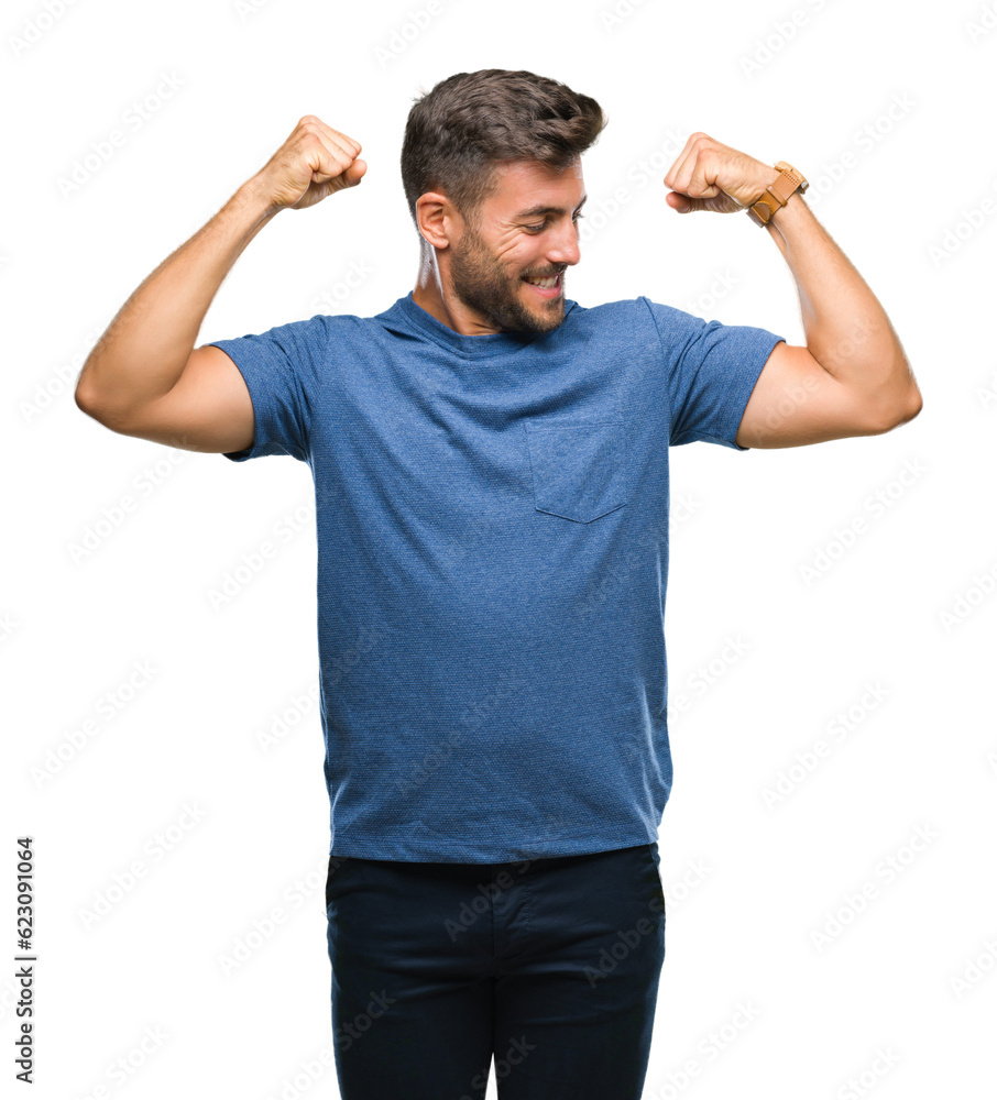 Young handsome man over isolated background showing arms muscles smiling proud. Fitness concept. Young handsome man over isolated background showing arms muscles smiling proud. Fitness concept.