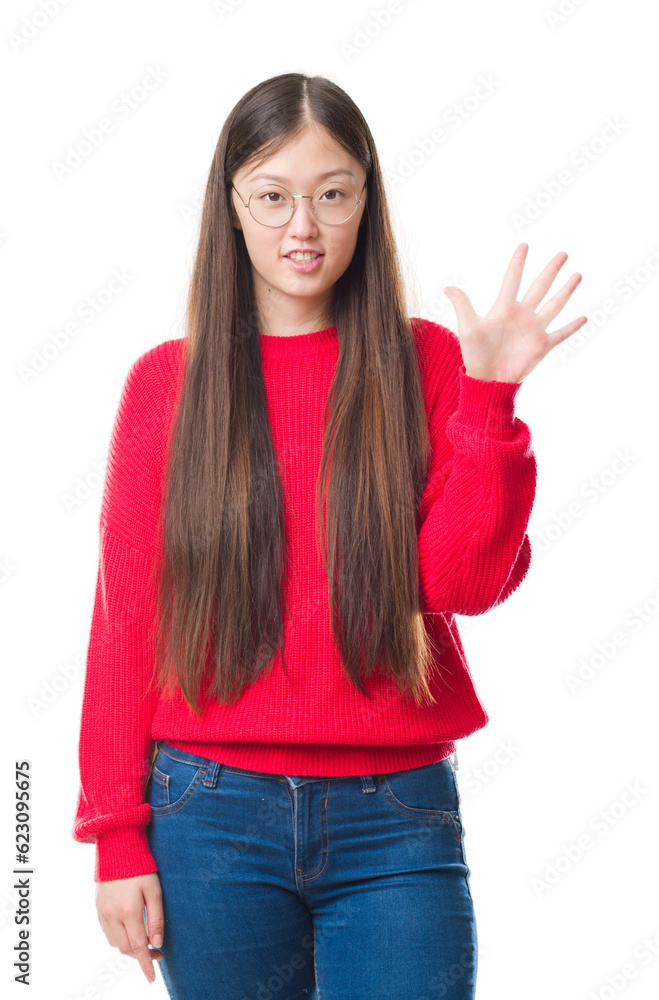 Young Chinese woman over isolated background wearing glasses showing and pointing up with fingers number five while smiling confident and happy. Young Chinese woman over isolated background wearing glasses showing and pointing up with fingers number five while smiling confident and happy.