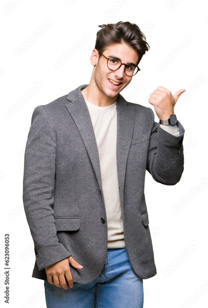 Young business man wearing glasses over isolated background smiling with happy face looking and pointing to the side with thumb up. Young business man wearing glasses over isolated background smiling with happy face looking and pointing to the side with thumb up.