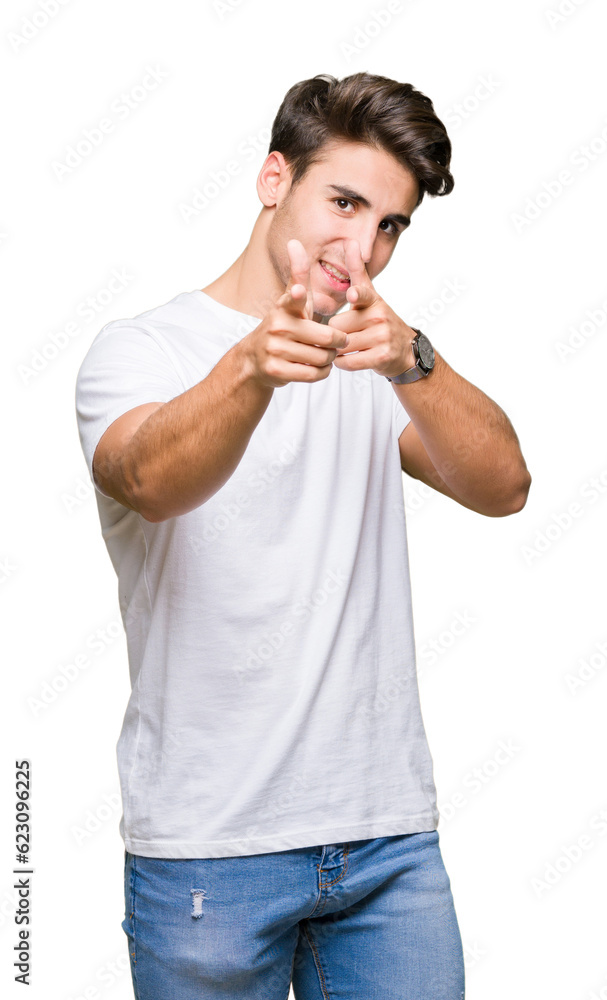 Young handsome man wearing white t-shirt over isolated background pointing fingers to camera with happy and funny face. Good energy and vibes. Young handsome man wearing white t-shirt over isolated background pointing fingers to camera with happy and funny face. Good energy and vibes.