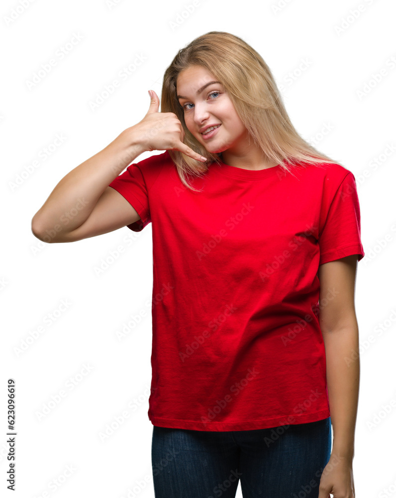 Young caucasian woman over isolated background smiling doing phone gesture with hand and fingers like talking on the telephone. Communicating concepts. Young caucasian woman over isolated background smiling doing phone gesture with hand and fingers like talking on the telephone. Communicating concepts.