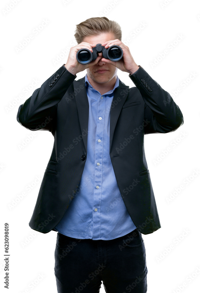 Young handsome blond man looking through binoculars with a confident expression on smart face thinking serious Young handsome blond man looking through binoculars with a confident expression on smart face thinking serious