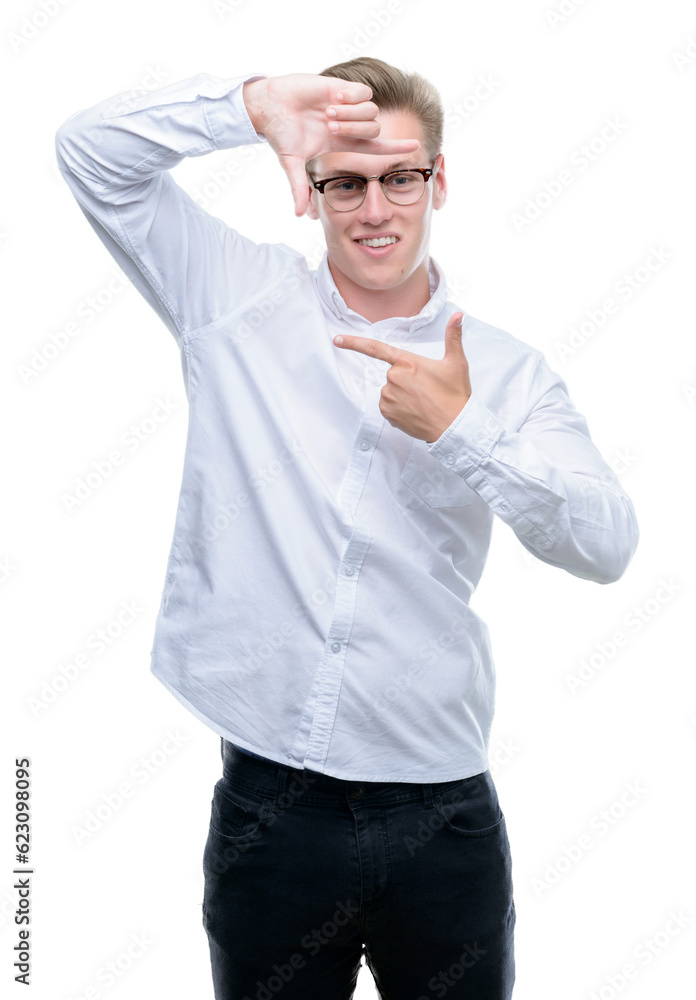 Young handsome blond man smiling making frame with hands and fingers with happy face. Creativity and photography concept. Young handsome blond man smiling making frame with hands and fingers with happy face. Creativity and photography concept.