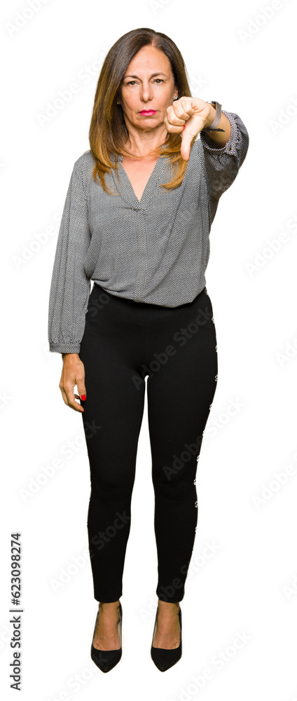 Beautiful middle age business woman looking unhappy and angry showing rejection and negative with thumbs down gesture. Bad expression. Beautiful middle age business woman looking unhappy and angry showing rejection and negative with thumbs down gesture. Bad expression.