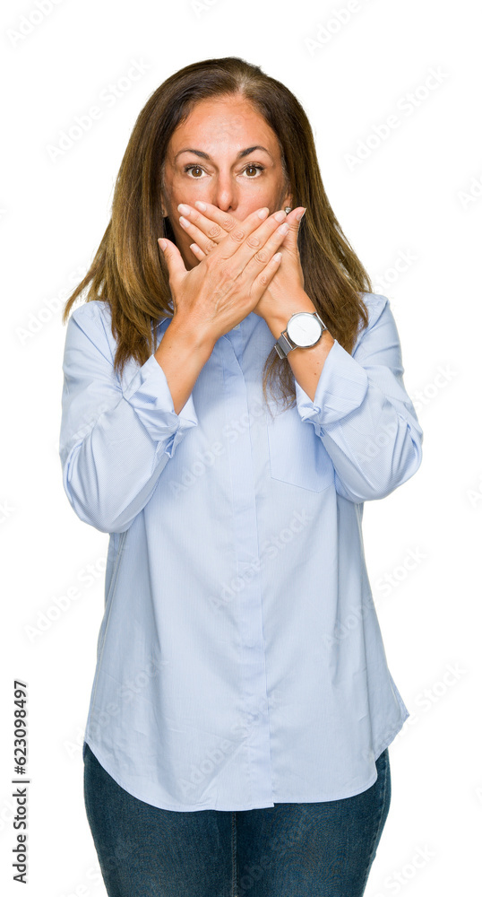 Beautiful middle age business adult woman over isolated background shocked covering mouth with hands for mistake. Secret concept. Beautiful middle age business adult woman over isolated background shocked covering mouth with hands for mistake. Secret concept.