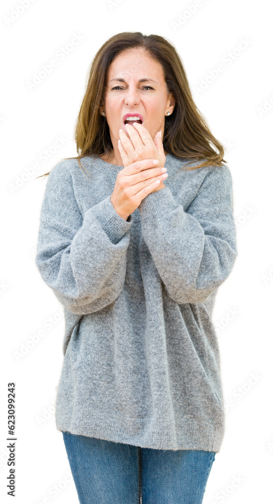 Beautiful middle age woman wearing winter sweater over isolated background Suffering pain on hands and fingers, arthritis inflammation Beautiful middle age woman wearing winter sweater over isolated background Suffering pain on hands and fingers, arthritis inflammation