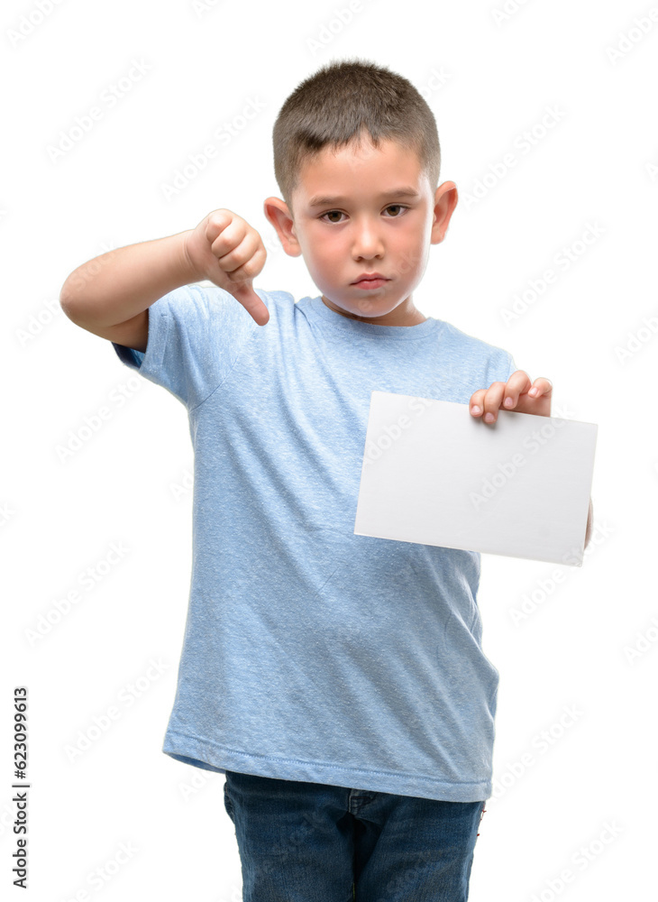 Dark haired little child holding a blank card with angry face, negative sign showing dislike with thumbs down, rejection concept Dark haired little child holding a blank card with angry face, negative sign showing dislike with thumbs down, rejection concept