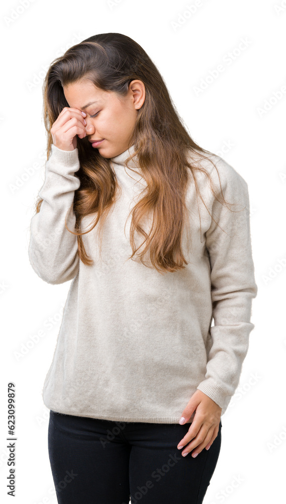 Young beautiful brunette woman wearing turtleneck sweater over isolated background tired rubbing nose and eyes feeling fatigue and headache. Stress and frustration concept. Young beautiful brunette woman wearing turtleneck sweater over isolated background tired rubbing nose and eyes feeling fatigue and headache. Stress and frustration concept.