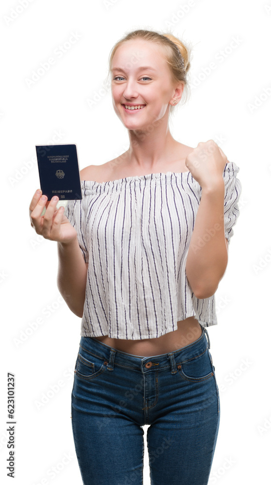 Blonde teenager woman holding passport of Germany screaming proud and celebrating victory and success very excited, cheering emotion Blonde teenager woman holding passport of Germany screaming proud and celebrating victory and success very excited, cheering emotion