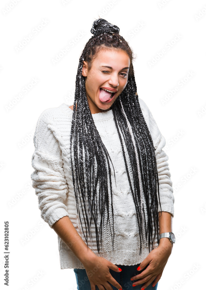 Young braided hair african american girl wearing sweater over isolated background sticking tongue out happy with funny expression. Emotion concept. Young braided hair african american girl wearing sweater over isolated background sticking tongue out happy with funny expression. Emotion concept.