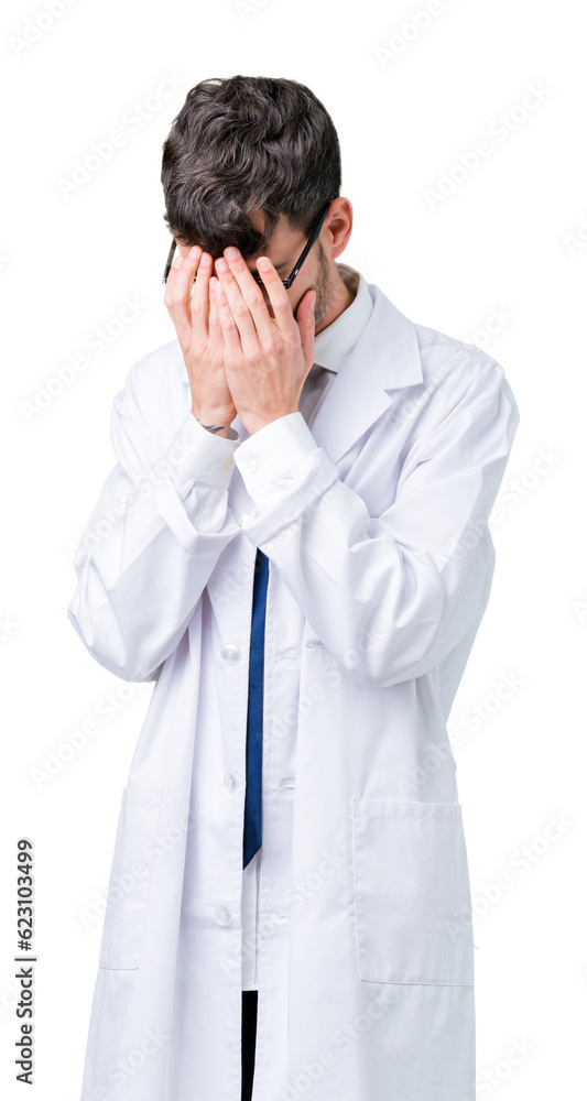 Young professional scientist man wearing white coat over isolated background with sad expression covering face with hands while crying. Depression concept. Young professional scientist man wearing white coat over isolated background with sad expression covering face with hands while crying. Depression concept.