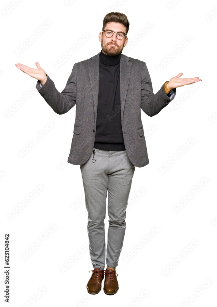 Young handsome business man wearing glasses clueless and confused expression with arms and hands raised. Doubt concept. Young handsome business man wearing glasses clueless and confused expression with arms and hands raised. Doubt concept.