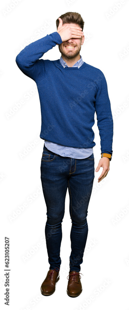 Young handsome bussines man smiling and laughing with hand on face covering eyes for surprise. Blind concept. Young handsome bussines man smiling and laughing with hand on face covering eyes for surprise. Blind concept.