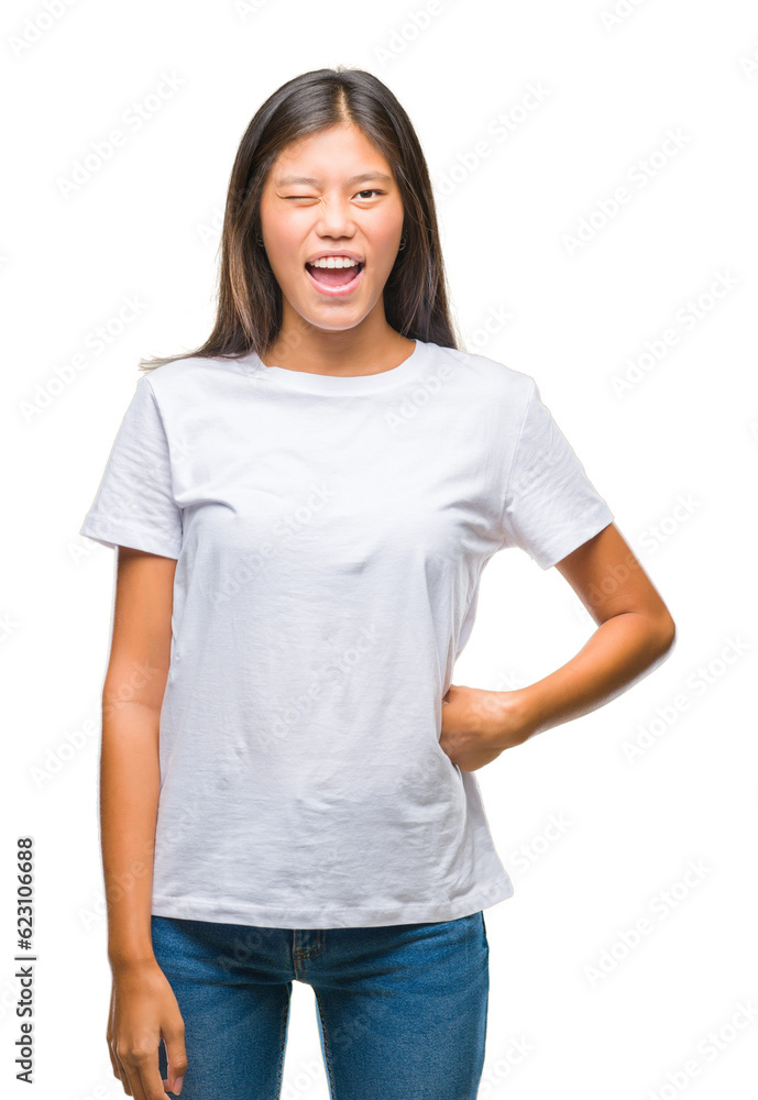 Young asian woman over isolated background winking looking at the camera with sexy expression, cheerful and happy face. Young asian woman over isolated background winking looking at the camera with sexy expression, cheerful and happy face.