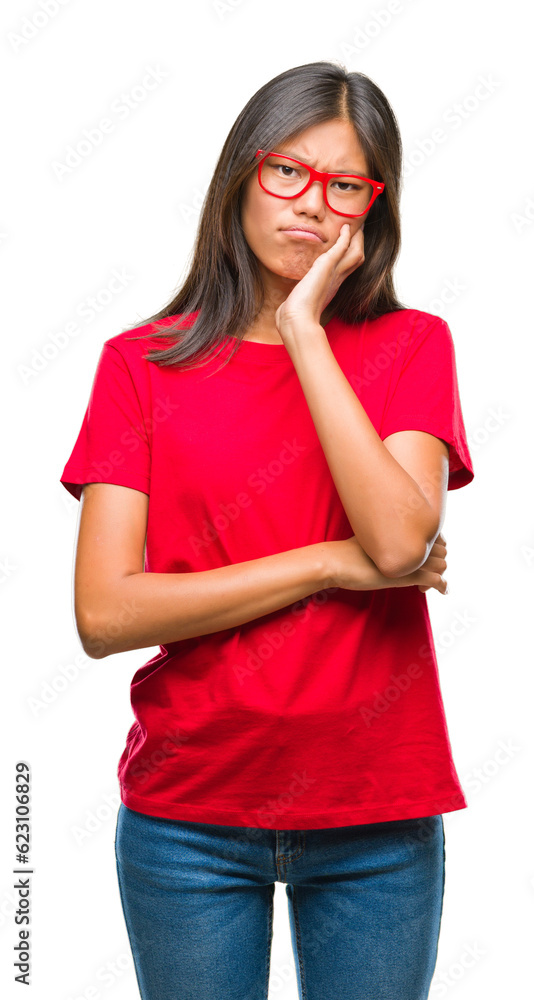 Young asian woman wearing glasses over isolated background thinking looking tired and bored with depression problems with crossed arms. Young asian woman wearing glasses over isolated background thinking looking tired and bored with depression problems with crossed arms.