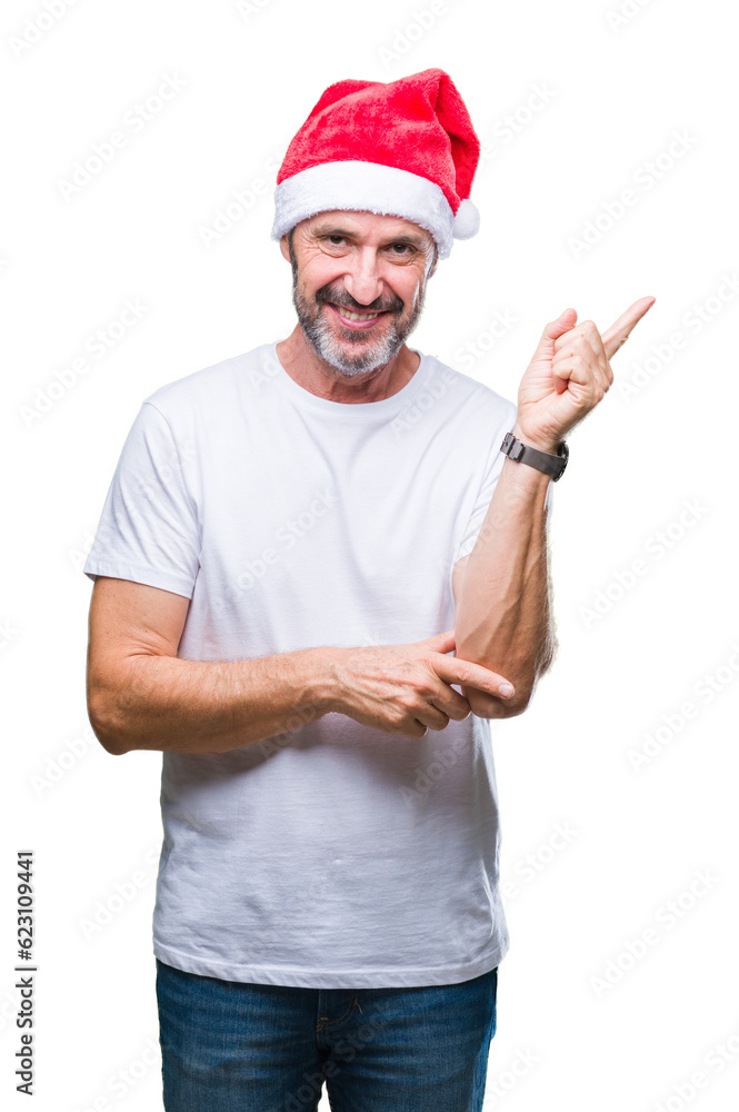 Middle age hoary senior man wearing christmas hat over isolated background with a big smile on face, pointing with hand and finger to the side looking at the camera. Middle age hoary senior man wearing christmas hat over isolated background with a big smile on face, pointing with hand and finger to the side looking at the camera.
