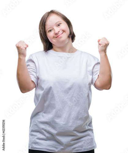 Young adult woman with down syndrome over isolated background very happy and excited doing winner gesture with arms raised, smiling and screaming for success. Celebration concept.