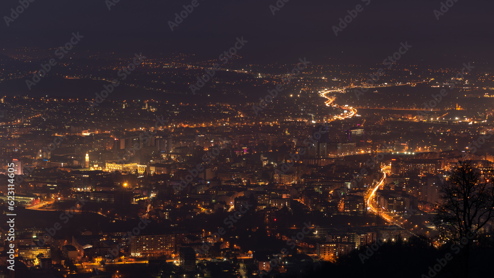 Cityscape of Banja Luka at night with city lights on