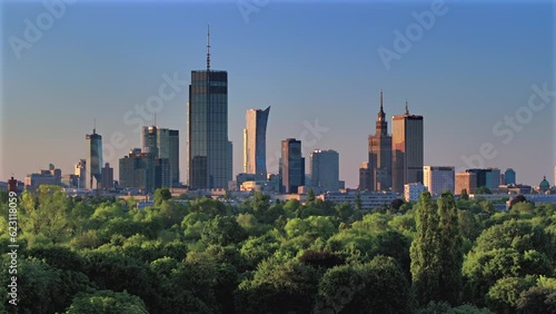 Aerial, drone panorama of Warsaw city during sunset. View from Pole Mokotowskie Park 