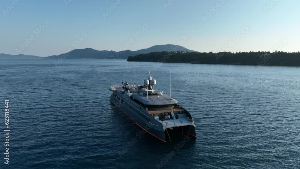 Corfu, Greece - July 4, 2023:Luxury hodor yacht navigate into beautiful blue water in corfu , Greece Corfu, Greece - July 4, 2023:Luxury hodor yacht navigate into beautiful blue water in corfu , Greece