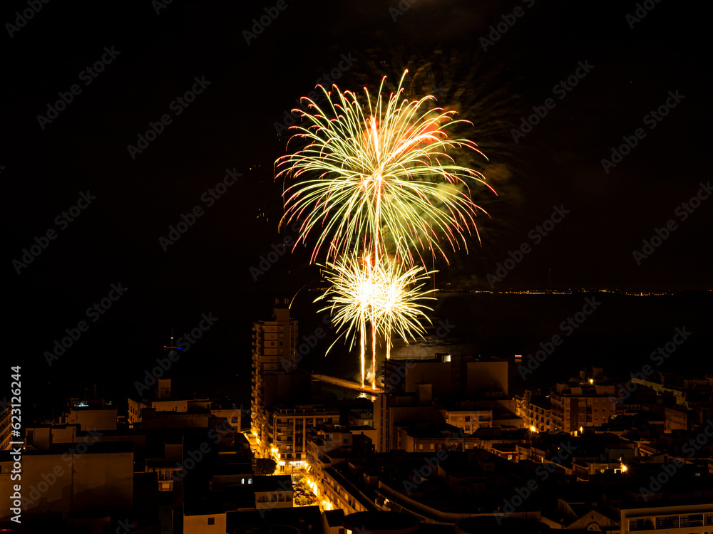 Fireworks during the Patron Saint and Moors and Christians Festivities in honor of the Loreto Virgin of Santa Pola, Alicante, Valencian Community, Spain. 