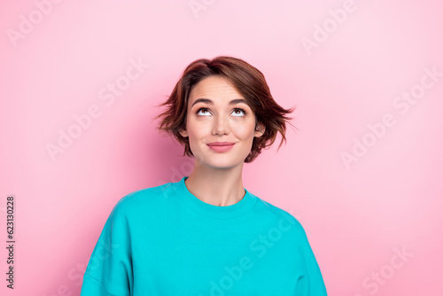 Fotografija Photo portrait of attractive young woman look up empty space dressed stylish blu