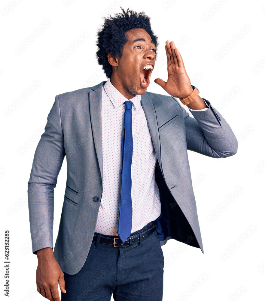 Handsome african american man with afro hair wearing business jacket shouting and screaming loud to side with hand on mouth. communication concept. Handsome african american man with afro hair wearing business jacket shouting and screaming loud to side with hand on mouth. communication concept.