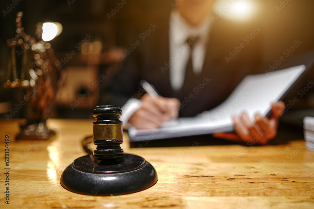 lawyers or attorneys discussing a contract agreement. Successful businessmen have a contract in place to protect it,signing of modest agreements form in office... lawyers or attorneys discussing a contract agreement. Successful businessmen have a contract in place to protect it,signing of modest agreements form in office...