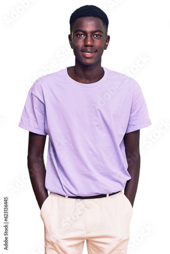 Young african american man wearing casual clothes with a happy and cool smile on face. lucky person.