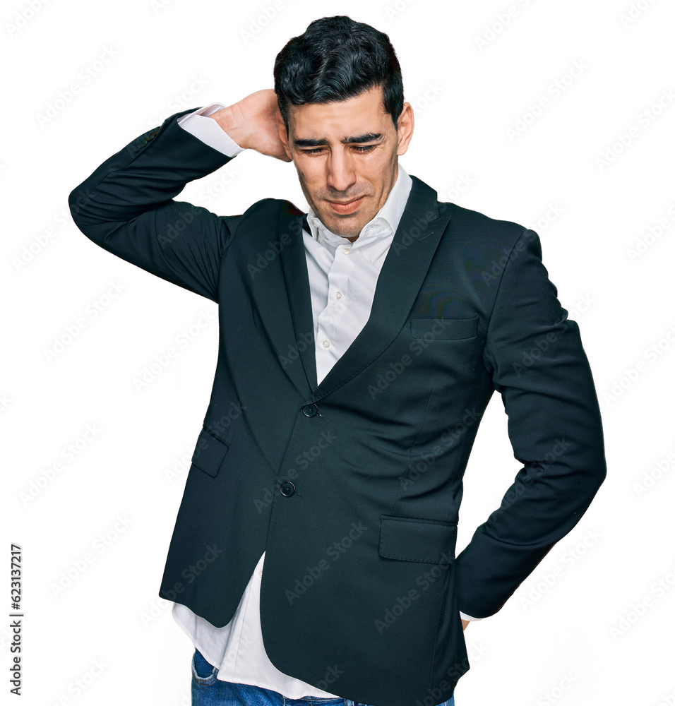 Handsome hispanic man wearing business clothes suffering of neck ache injury, touching neck with hand, muscular pain Handsome hispanic man wearing business clothes suffering of neck ache injury, touching neck with hand, muscular pain