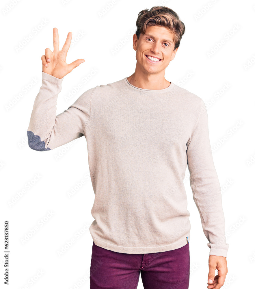 Young handsome man wearing casual clothes showing and pointing up with fingers number three while smiling confident and happy. Young handsome man wearing casual clothes showing and pointing up with fingers number three while smiling confident and happy.