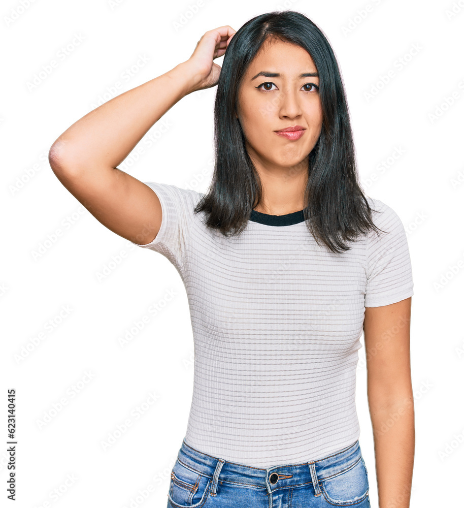 Beautiful asian young woman wearing casual white t shirt confuse and wonder about question. uncertain with doubt, thinking with hand on head. pensive concept. Beautiful asian young woman wearing casual white t shirt confuse and wonder about question. uncertain with doubt, thinking with hand on head. pensive concept.