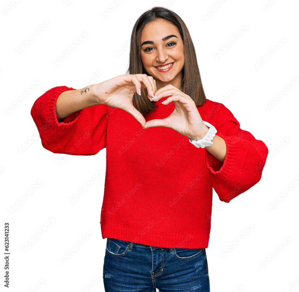 Beautiful brunette woman wearing casual winter sweater smiling in love doing heart symbol shape with hands. romantic concept. Beautiful brunette woman wearing casual winter sweater smiling in love doing heart symbol shape with hands. romantic concept.