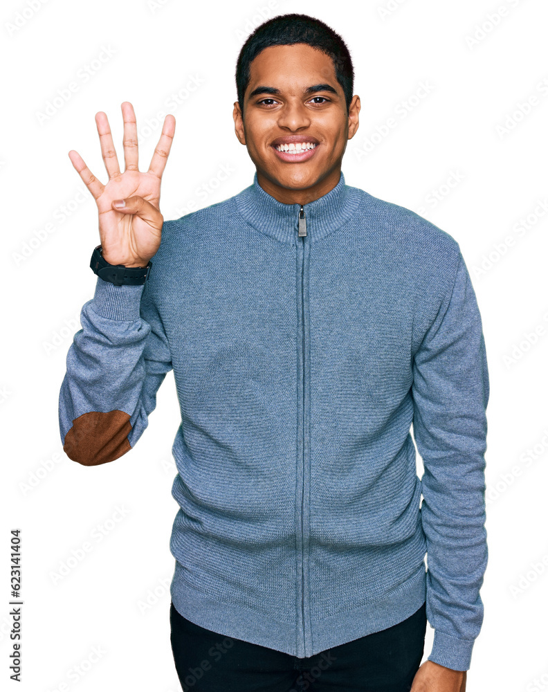 Young handsome hispanic man wearing casual sweatshirt showing and pointing up with fingers number four while smiling confident and happy. Young handsome hispanic man wearing casual sweatshirt showing and pointing up with fingers number four while smiling confident and happy.