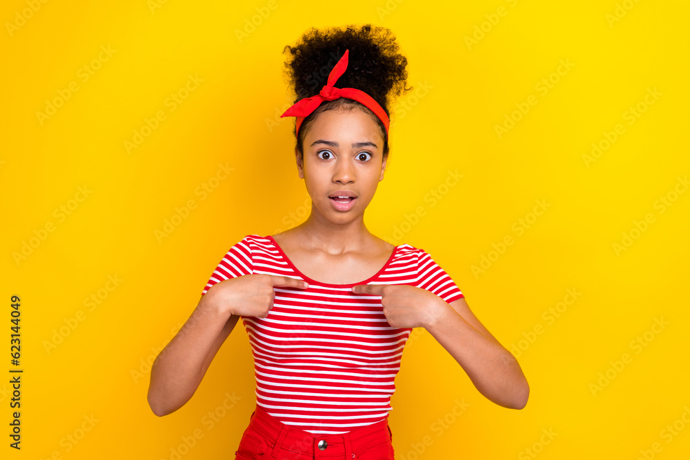 Photo of impressed funky girl dressed red striped t-shirt pointing fingers herself isolated yellow color background Photo of impressed funky girl dressed red striped t-shirt pointing fingers herself isolated yellow color background