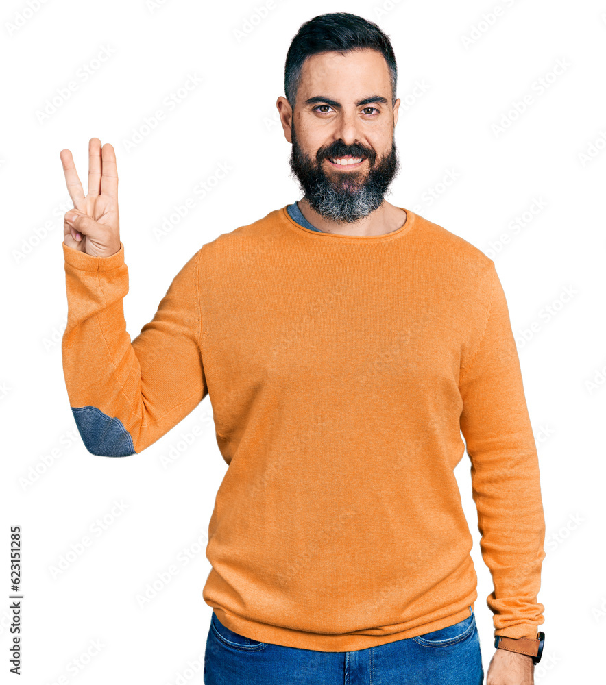 Hispanic man with beard wearing casual winter sweater showing and pointing up with fingers number three while smiling confident and happy. Hispanic man with beard wearing casual winter sweater showing and pointing up with fingers number three while smiling confident and happy.