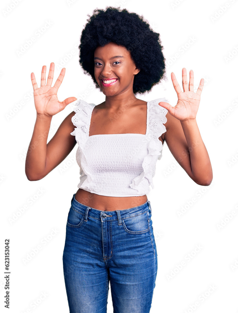 Young african american woman wearing casual clothes showing and pointing up with fingers number ten while smiling confident and happy. Young african american woman wearing casual clothes showing and pointing up with fingers number ten while smiling confident and happy.