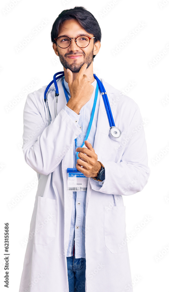 Handsome hispanic man wearing doctor uniform and stethoscope serious face thinking about question with hand on chin, thoughtful about confusing idea Handsome hispanic man wearing doctor uniform and stethoscope serious face thinking about question with hand on chin, thoughtful about confusing idea