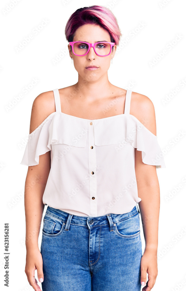 Young beautiful woman with pink hair wearing casual clothes and glasses skeptic and nervous, frowning upset because of problem. negative person. Young beautiful woman with pink hair wearing casual clothes and glasses skeptic and nervous, frowning upset because of problem. negative person.