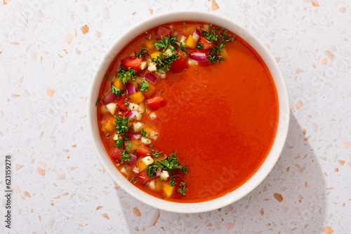 фотографія Spanish tomato gazpacho cold soup styled and decorated in white plate